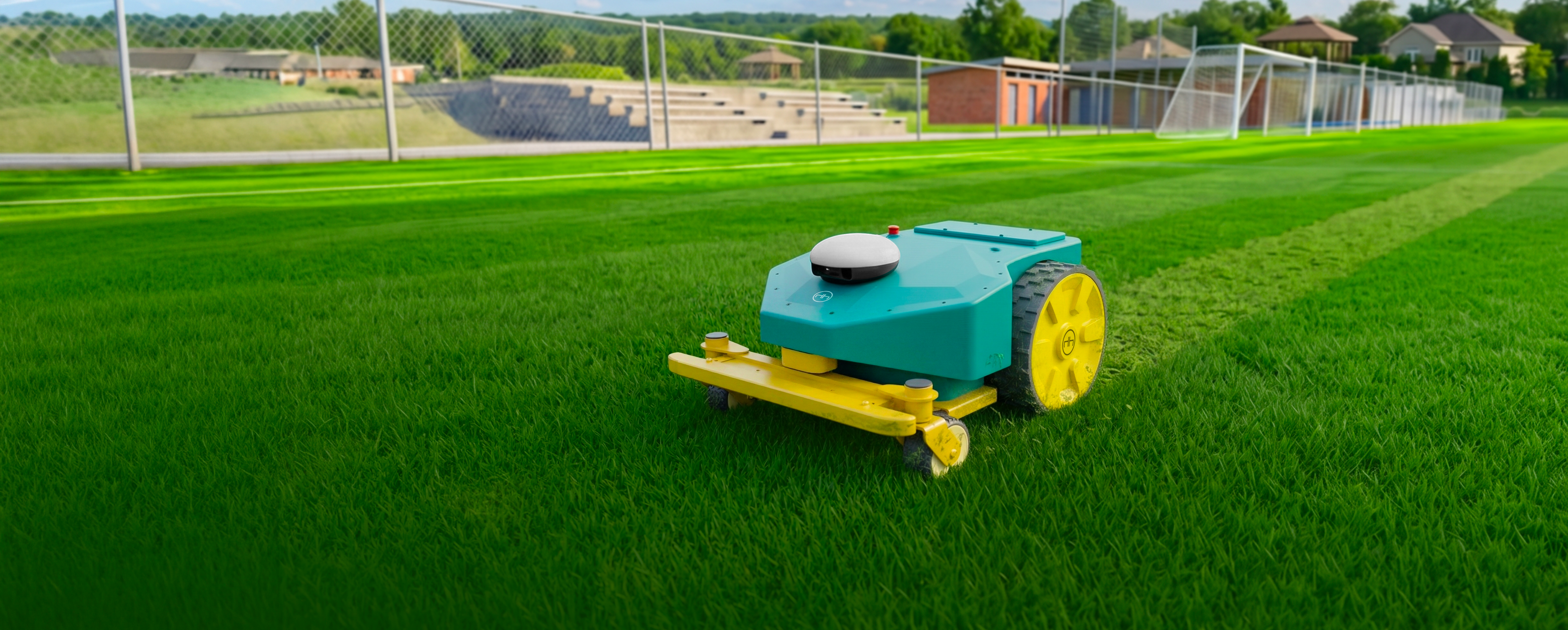 Robot de tonte autonome Moxy 520 sur terrain sportif